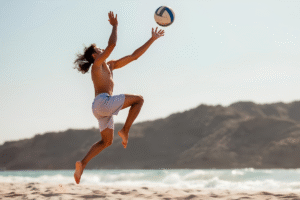 Volleyball player dribbling on a court